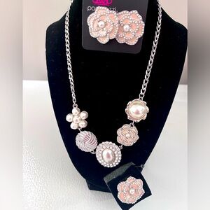 Necklace, earrings and ring.